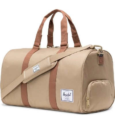 Shop Herschel Supply Co Novel Duffle Bag - Beige In Kelp/ Saddle Brown