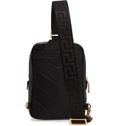 Shop Versace Logo Leather Sling Bag - Black In Black Warm Gold