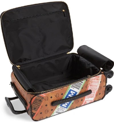 Shop Mcm Stark Flight Print Trolley Wheeled Suitcase - Brown In Cognac