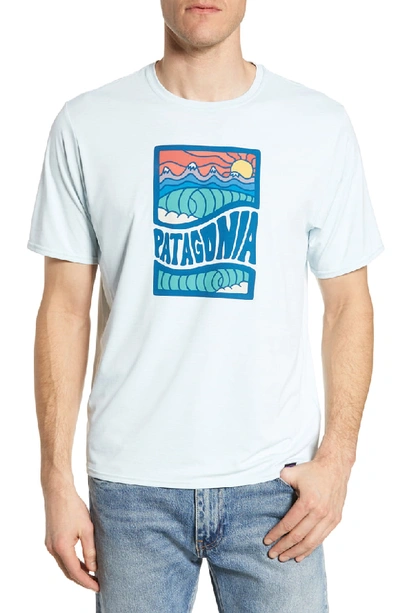 Shop Patagonia Capilene Cool Daily Graphic T-shirt In Cosmic Peaks Atoll Blue