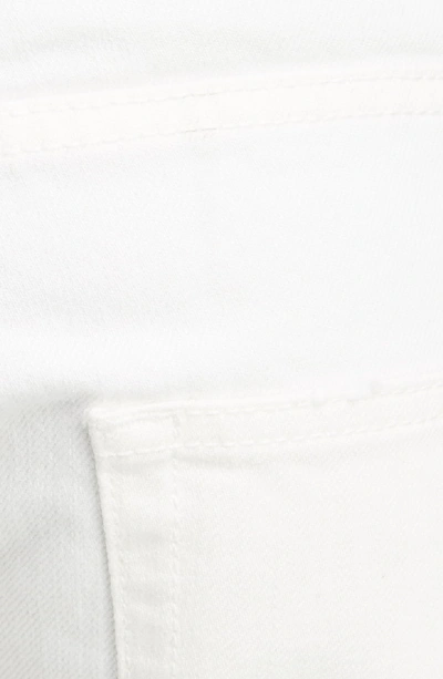 Shop Saint Laurent Slim Fit Distressed Jeans In White Stonewash