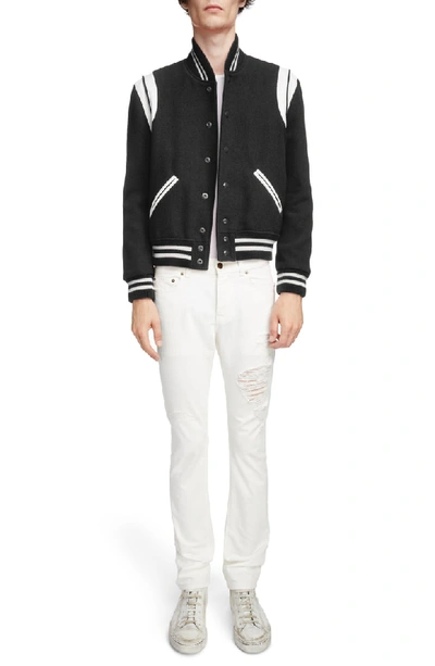 Shop Saint Laurent Slim Fit Distressed Jeans In White Stonewash