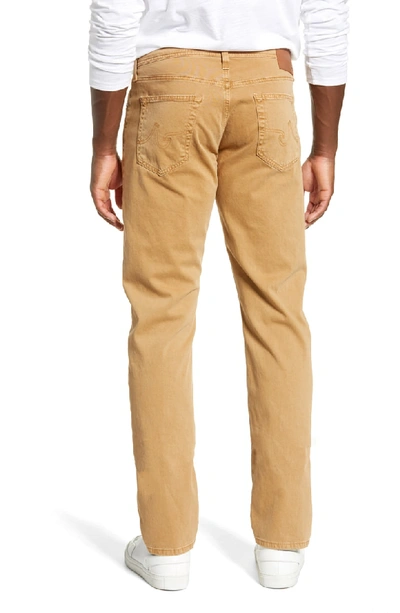 Shop Ag Everett Sud Slim Straight Leg Pants In Sulfur Tawny Um