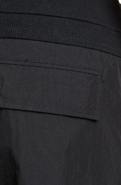 Shop John Elliott Paneled Nylon Cargo Shorts In Black