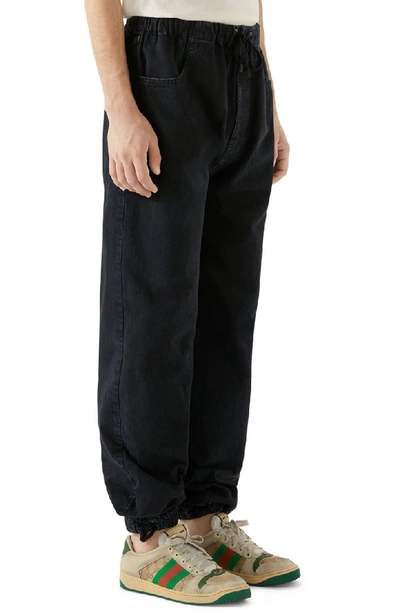 Shop Gucci Denim Jogger Pants In Black Multi Color