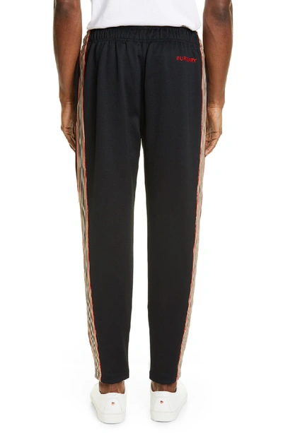 Shop Burberry Sorrento Icon Stripe Slim Fit Track Pants In Black