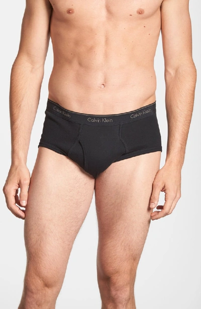 Shop Calvin Klein 4-pack Cotton Briefs In Black