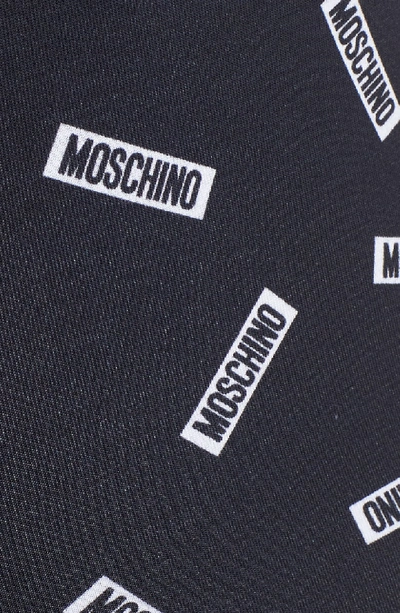 Shop Moschino Allover Tag Trunks In Black