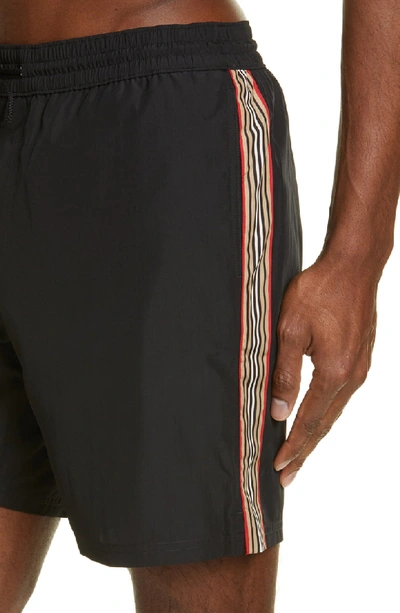 Shop Burberry Grafton Swim Trunks In Black