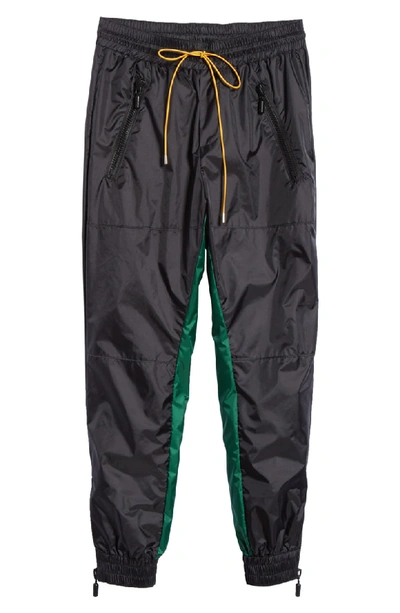Shop Rhude Nylon Track Pants In Black/green