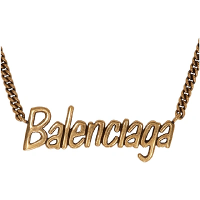 Shop Balenciaga Gold Typo Necklace In 0604 Gold