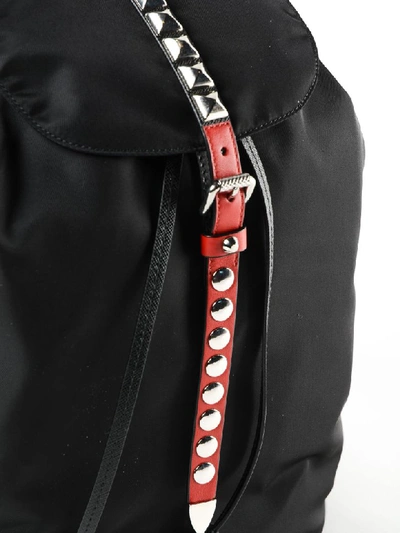 Shop Prada Studded Backpack In D9a Nero+fuoco