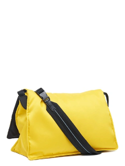 Shop Prada Messenger Bag In Yellow