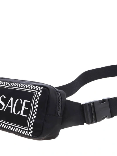 Shop Versace Logo Print Belt Bag In Black