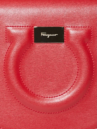 Shop Ferragamo Gancini Crossbody Bag In Rosso