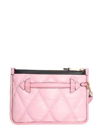 Shop Moschino Quilted Clutch In Rosa