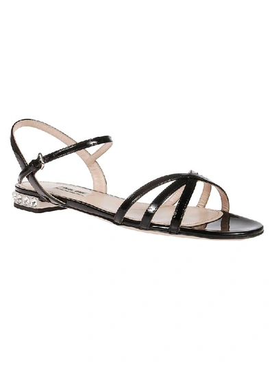 Shop Miu Miu Embellished Sandals In Black