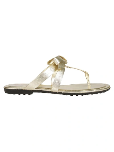 Shop Tod's Embossed Logo Flat Sandals In Gold