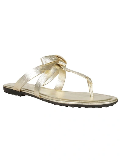 Shop Tod's Embossed Logo Flat Sandals In Gold