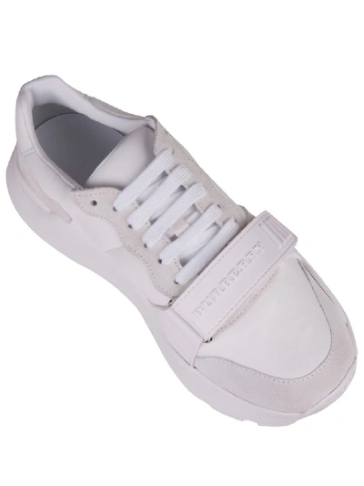 Shop Burberry Sneakers In White