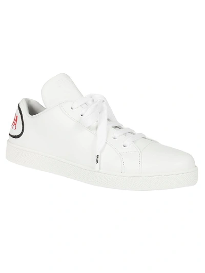 Shop Prada Comics Sneakers In White