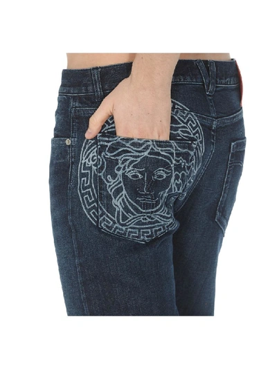 Shop Versace Logo Detail Jeans In Denim