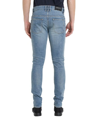 Shop Balmain Distressed Jeans In Blu