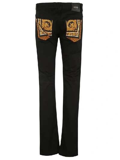 Shop Versace Signature Wilde Detail Jeans In Black