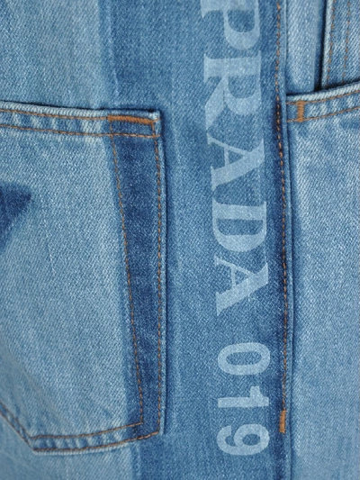 Shop Prada Logo Print Jeans In Light Blue