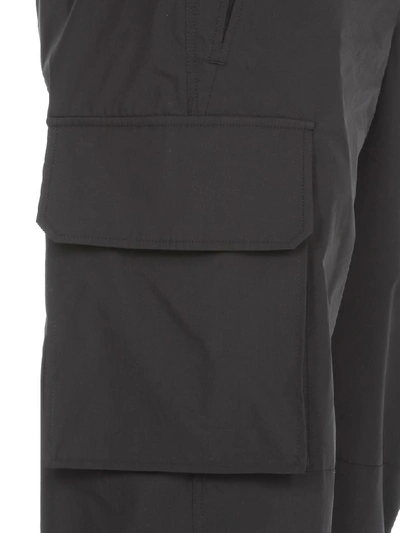Shop Neil Barrett Cargo Trousers In Black