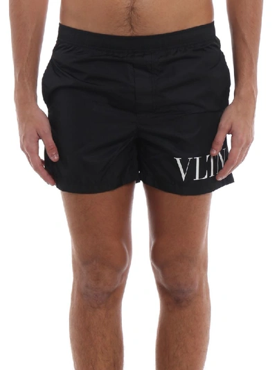 Shop Valentino Vltn Logo Printed Swim Shorts In No Black