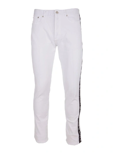 Shop Givenchy Jeans In White