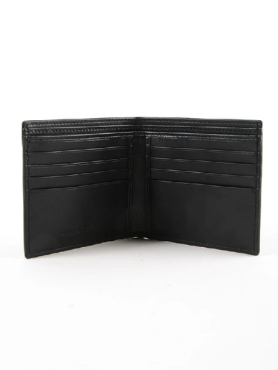 Shop Alexander Mcqueen Skeleton Embossed Wallet In Black