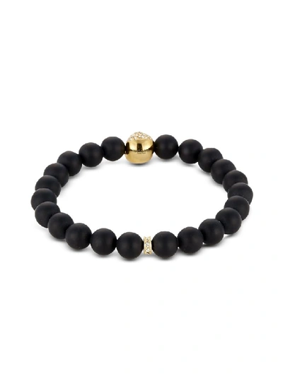 Shop Northskull Matte Black Onyx/gold Skull Bracelet With Crystals