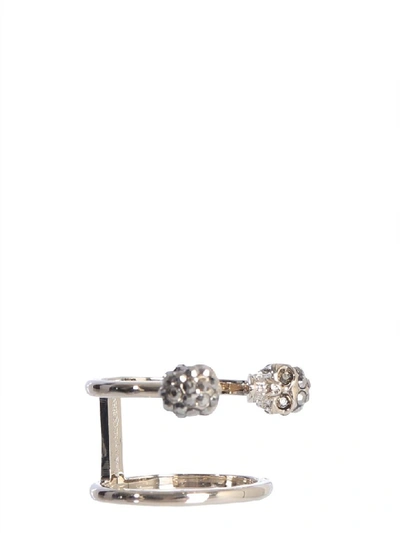 Shop Alexander Mcqueen Twin Skull Double Ring In Giallo