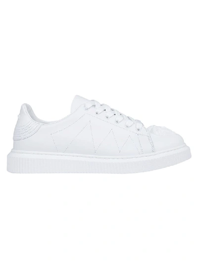 Shop Versace Sneakers In White