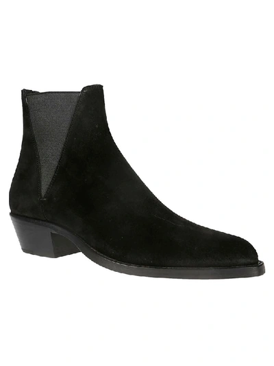 Shop Saint Laurent Dakota Chelsea Boots In Black