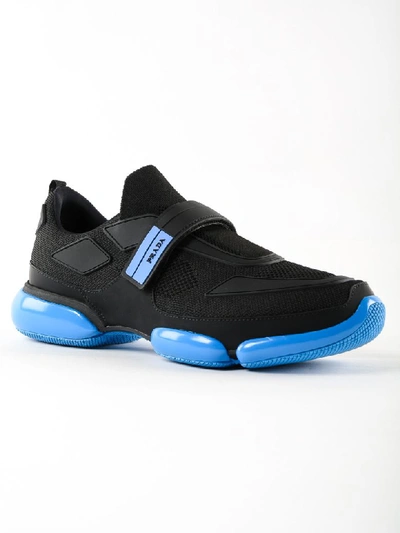 Shop Prada Cloudbust Sneakers In J Nero+voyage