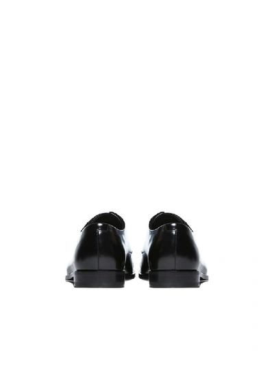 Shop Prada Laced Shoes In Nero