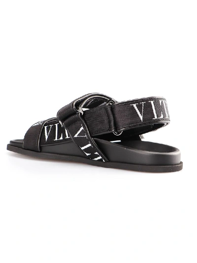 Shop Valentino Logo Sandals In Ni Black/white