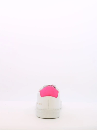 Shop Common Projects Sneaker Pink Neon Leather In White