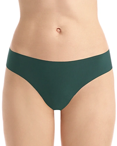 Shop Commando Butter Mid-rise Thong In Forest