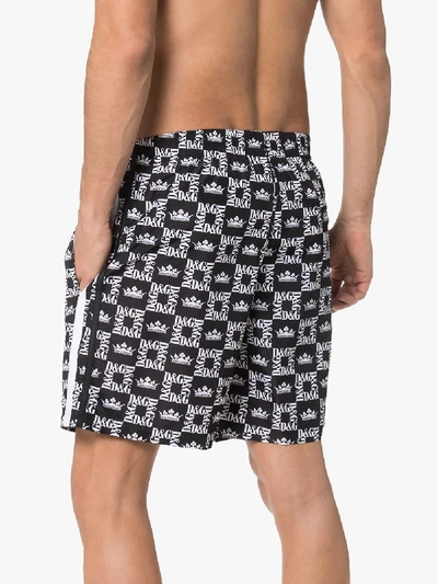 Shop Dolce & Gabbana Logo Printed Swim Shorts In Black