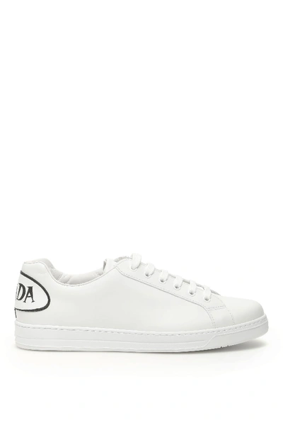 Shop Prada Logo Printed Sneakers In White