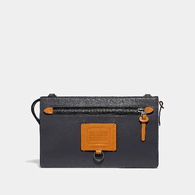Shop Coach Rivington Convertible Pouch In Midnight/amber