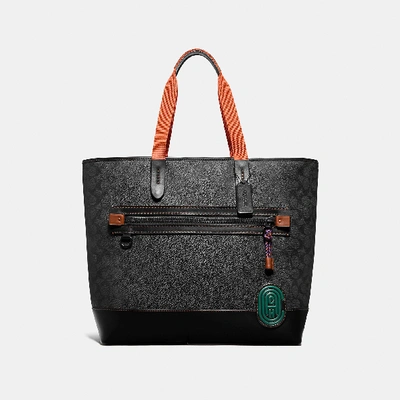 Shop Coach Academy Tote In Signature Canvas With Wild Beast Print In Green Wild Beast Signature/black Copper