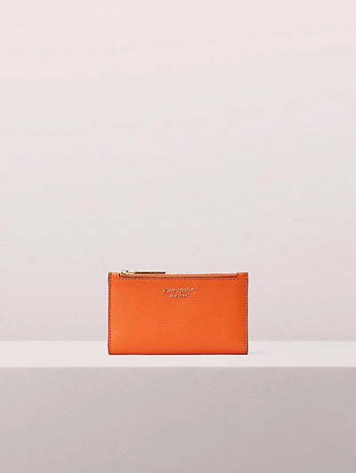 Shop Kate Spade Sylvia Small Slim Bifold Wallet In Juicy Orange
