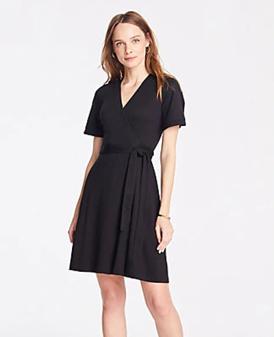 Shop Ann Taylor Piped Flutter Sleeve Wrap Dress In Black