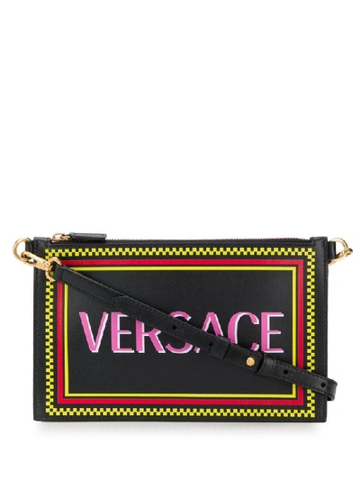 Shop Versace Logo Zipped Clutch Bag In Multi