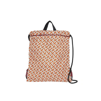 Shop Burberry Monogram Print Nylon Drawcord Backpack In Vermillion
